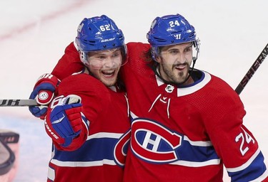 Artturi Lehkonen, left, celbrates his goal against the Winnipeg Jets with Phillip Danault during first-period action in Montreal on Monday, June 7, 2021.