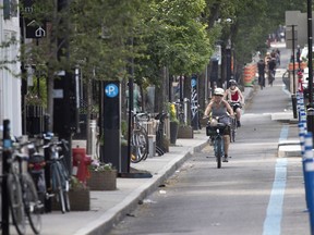 The Réseau express vélo, a dedicated bicycle path on both sides of St-Denis St., opened in November.
