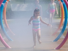 Swimming pools and water parks are welcome  fun for kids like Anna  during the heatwave in Pincourt on Monday, June 7, 2021.