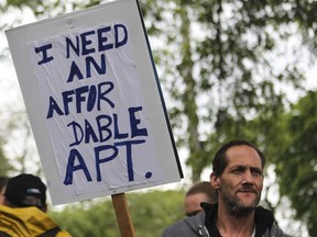 Richard Dow takes part in a protest for affordable housing in 2019.