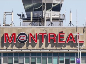 The sign on top of the main terminal at Trudeau Airport shows support for the Montreal Canadiens playoff efforts on June 12, 2021.