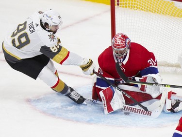 Canadiens' Carey Price makes a save on shot by Vegas Golden Knights' Alex Tuch during the first period of the National Hockey League playoff game in Montreal on Friday, June 18, 2021.