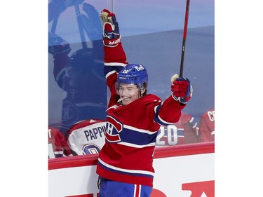 Canadiens' Cole Caufield celebrates his goal against the Vegas Golden Knights during the second period of a National Hockey League playoff game in Montreal on Friday, June 18, 2021.