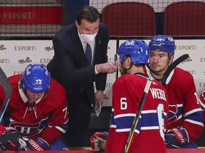 Luke Richardson gives instructions to Canadiens captain Shea Weber during Game 3 of Stanley Cup semifinal series against the Vegas Golden Knights at the Bell Centre during his debut as an NHL head coach.