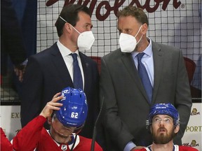 Canadiens assistant coach Luke Richardson (left) and director of goaltending Sean Burke talk behind bench during Game 3 of Stanley Cup semifinal series against the Vegas Golden Knights at the Bell Centre. Richardson made his NHL head-coaching debut in the game, filling in for Dominique Ducharme, who tested positive for COVID-19.