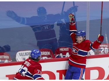 Canadiens' Cole Caufield celebrates his goal against Vegas Golden Knights with Tyler Toffloi during the second period of the National Hockey League playoff game in Montreal on Friday, June 18, 2021.