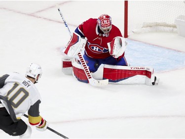 MONTREAL, QUE.: JUNE  18, 2021 -- Montreal Canadiens Carey Price makes a glove save off shot by Vegas Golden Knights Nicolas Roy during first period of National Hockey League playoff game in Montreal Friday June 18, 2021. (John Mahoney / MONTREAL GAZETTE) ORG XMIT: 66308 - 2695