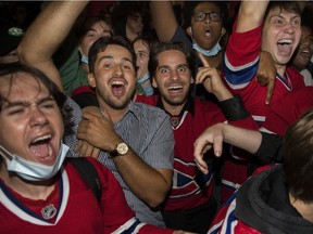 Fans celebrate outside the Bell Centre after the Canadiens beat the Vegas Golden Knights 3-2 in overtime in Game 3 of their Stanley Cup semifinal series.