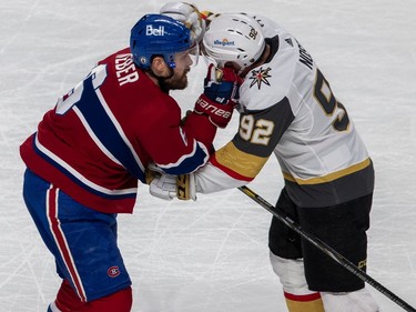 Canadiens defenceman Shea Weber (6) had words with Vegas Golden Knights' Tomas Nosek (92) after being checked into the boards during second period NHL Stanley Cup semifinal action at the Bell Centre in Montreal on Sunday, June 20, 2021.