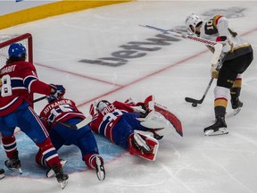 Canadiens goalie Carey Price desperately but unsuccessfully tries to stop the Vegas Golden Knights’ Nicolas Roy from scoring the winning goal in overtime of Game 4 of Stanley Cup semifinal series Sunday night at the Bell Centre. Vegas evened up the series 2-2 with the 2-1 OT win.