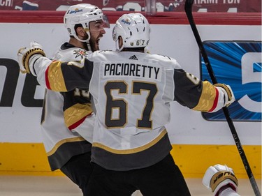 Vegas Golden Knights centre Nicolas Roy (10) is congratulated by teammate Max Pacioretty (67) during NHL Stanley Cup semifinal overtime action at the Bell Centre in Montreal on Sunday, June 20, 2021.