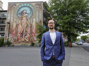 Christian Arseneault in front of the Our Lady of Grace mural on Sherbrooke St. in N.D.G. The councillor for Loyola district says he has no regrets about leaving Projet Montréal.