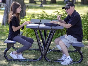 Eliane Goldstein interviews Holocaust survivor Johnny Jablon in a park in Côte-St-Luc for a podcast she is doing for her bat mitzvah project.
