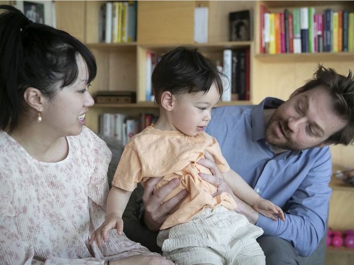  Vi Nguyen and Simon Ducharme with their 2 1/2-year-old son Lionel Ducharme.at home on Thursday, June 17, 2021.