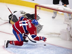 The Canadiens’ Brendan Gallagher grabs the puck after Artturi Lehkonen scored in overtime for a 3-2 win over the Vegas Golden Knights in Game 6 of semifinal series at the Bell Centre to clinch a spot in Stanley Cup final.