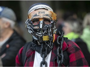 A protester makes a statement at an anti-mask protest at La Fontaine Park in Montreal on Sept. 30, 2020, during the COVID-19 pandemic.