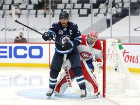 Jets' Blake Wheeler screens Canadiens goaltender Carey Price in Game 2 of the second round of the 2021 Stanley Cup playoffs on Friday, June 4, 2021, at Bell MTS Place in Winnipeg.