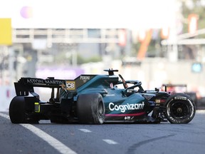 The broken car of Lance Stroll of Montreal and Aston Martin F1 Team is seen on the track after a crash during the F1 Grand Prix of Azerbaijan at Baku City Circuit on Sunday, June 6, 2021, in Baku, Azerbaijan.