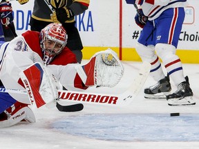 Carey Price #31 of the Montreal Canadiens allows a goal to Alec Martinez (not pictured) of the Vegas Golden Knights during the second period in Game One of the Stanley Cup Semifinals during the 2021 Stanley Cup Playoffs at T-Mobile Arena on June 14, 2021 in Las Vegas, Nevada.