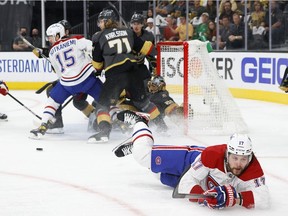Josh Anderson #17 of the Montreal Canadiens slides on the ice after his shot was blocked by Marc-Andre Fleury #29 of the Vegas Golden Knights in the first period in Game One of the Stanley Cup Semifinals during the 2021 Stanley Cup Playoffs at T-Mobile Arena on June 14, 2021.