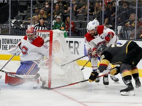 William Carrier of the Vegas Golden Knights attempts a wraparound on Carey Price of the Montreal Canadiens as Shea Weber defends during the second period in Game Two at T-Mobile Arena on June 16, 2021, in Las Vegas.