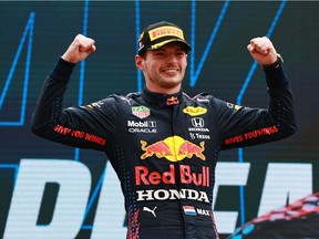 Race winner Max Verstappen of Netherlands and Red Bull Racing celebrates on the podium during the F1 Grand Prix of France at Circuit Paul Ricard on June 20, 2021 in Le Castellet, France.