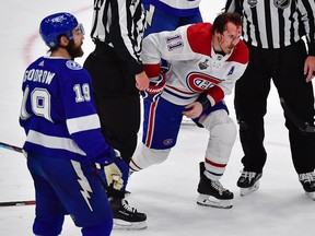 The Canadiens’ Brendan Gallagher gets up with a bloody face after his helmet-less head was slammed into the ice by Tampa Bay Lightning defenceman Mikhail Sergachev in Game 1 of Stanley Cup final.
