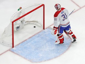 Canadiens goalie Carey Price reacts after allowing a goal to Yanni Gourde during second period of 5-1 loss to the Lightning in Game 1 of Stanley Cup final Monday night in Tampa.