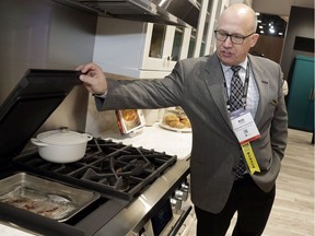 A luxury range with built-in sous vide capacity is shown at a trade fair in Las Vegas in 2019. "Low-temperature cooking flew under the radar until French chef Georges Pralus discovered in 1974 that foie gras cooked at a low temperature in a vacuum-sealed plastic bag immersed in water kept its original appearance, retained its fat content, and had a better texture," Joe Schwarcz writes.
