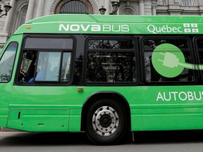 A new Nova Bus electric bus sits outside Montreal City Hall on Friday May 15, 2015.