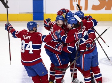Montreal Canadiens celebrate scoring against Vegas Golden Knights goaltender Robin Lehner (90)  during NHL semi final game 6  in Montreal on Thursday, June 24, 2021.