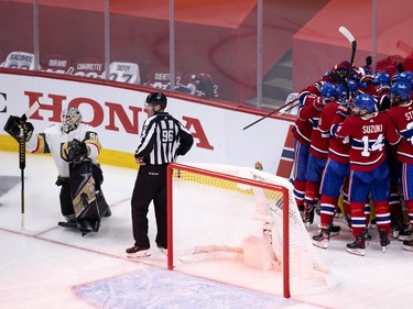 Montreal Canadiens celebrate scoring the winning goal against Vegas Golden Knights to advance to the Stanley Cup final  in Montreal on Thursday, June 24, 2021.