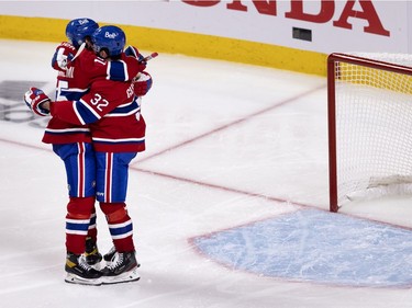 Montreal Canadiens center Jesperi Kotkaniemi (15) and defenseman Erik Gustafsson (32)celebrate  after the Canadiens defeated the Vegas Knights to advance to the Stanley Cup final during NHL semi final game 6  in Montreal on Thursday, June 24, 2021.