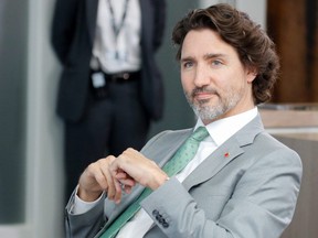 Prime Minister Justin Trudeau attends a plenary session during G7 summit in Carbis Bay, Cornwall, Britain, on June 13. The Trudeau government will legislate to formally recognize French as the official language of Quebec, it was reported Monday.