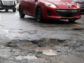 Potholes "can do much worse than car damage. They could injure cyclists, scooter riders, pedestrians or the eyes of anyone who thinks an important road in one of the world’s most beautiful cities should not look like it is in a war zone," Martine St-Victor writes.