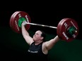 This file photo taken on April 9, 2018, shows New Zealand's Laurel Hubbard competing during the women's 90+ kg weightlifting final at the 2018 Gold Coast Commonwealth Games in Gold Coast.