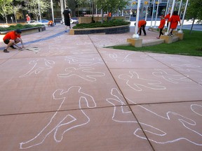 The Treaty 7 community expressed grief through art to honour the remains of 215 children discovered at a former residential school in Kamloops, B.C. at the Harry Hays building in Calgary on Monday, May 31, 2021.