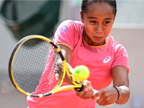 Laval's Leylah Annie Fernandez returns the ball to Madison Keys of the U.S. during their second-round match at the French Open in Paris on June 2, 2021.