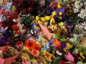 Flowers are seen at a makeshift memorial at the fatal crime scene in London, Ont., where four members of a Muslim family were killed. "I worry whether the change that is needed will come in my lifetime or in that of my children's, whether even more families will have to bury their loved ones," Fariha Naqvi-Mohamed writes.