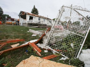Homes were damaged by a tornado that touched down in Mascouche June 2021.