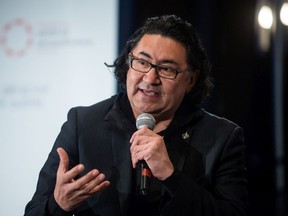 Romeo Saganash speaks during a panel discussion about the Indian Residential School system at the Truth and Reconciliation Commission into residential schools in Montreal on Friday, April 26, 2013.