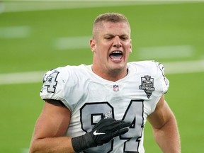 FILE PHOTO: Las Vegas Raiders defensive end Carl Nassib celebrates at the end of the game against the Los Angeles Chargers at SoFi Stadium in Inglewood, California, U.S. November 8, 2020.   Mandatory Credit: -USA TODAY Sports/File Photo
