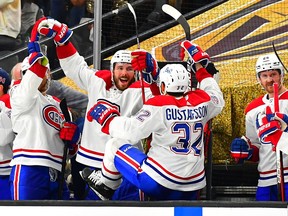 Montreal Canadiens players celebrate on bench after beating the Golden Knights 3-2 in Game 2 of their Stanley Cup semifinal series Wednesday night in Las Vegas.