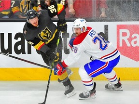 Vegas Golden Knights centre Patrick Brown shoots against Montreal Canadiens defenceman Jeff Petry during the second period of Game 2  at T-Mobile Arena on June 16, 2021, in Las Vegas.