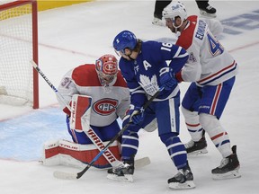 Montreal Canadiens goalie Carey Price makes a save as defenceman Joel Edmundson covers Toronto Maple Leafs forward Mitch Marner in Game 7 at Scotiabank Arena in Toronto on May 31, 2021.
