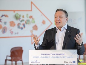 Quebec Premier Francois Legault speaks during a news conference in Montreal, Sunday, June 13, 2021, where he unveiled a Youth Action Plan 2021-2024.