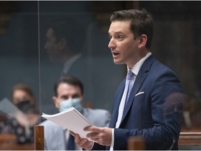 Quebec Justice Minister Simon Jolin-Barrette, responsible for French language, presents legislation to modify the language law, Thursday, May 13, 2021 at the legislature in Quebec City.