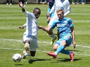 Chicago Fire forward Robert Beric fires the ball past CF Montréal midfielder Victor Wanyama last month at Soldier Field. CF Montréal won the game 1-0.