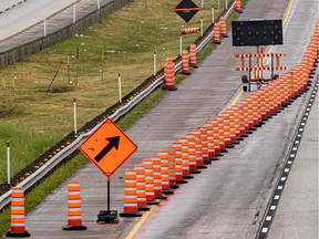 Construction cones line a highway.