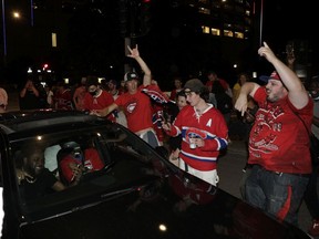 Canadiens fans celebrate in downtown Montreal after the team eliminated the Vegas Golden Knights from the playoffs on Thursday, June 24, 2021.